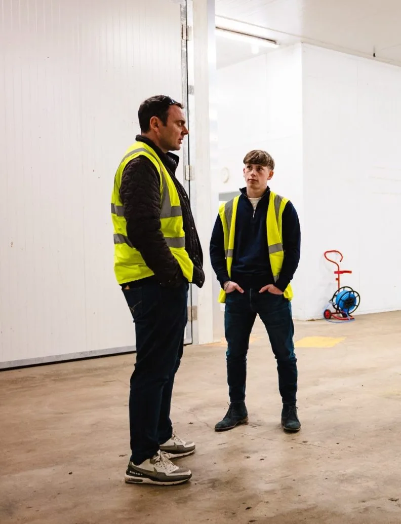 Two team members talking